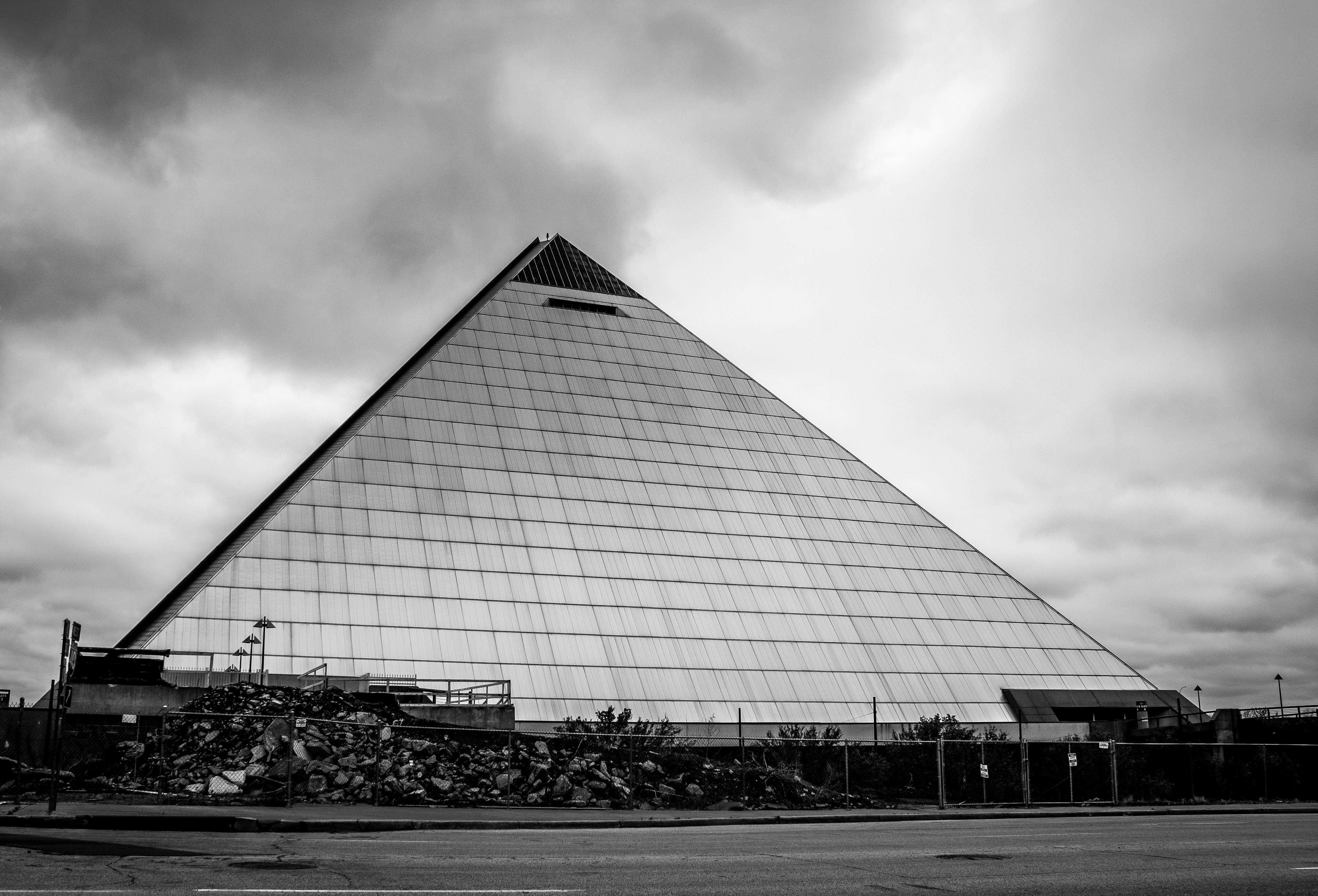 A black and white photo of the Memphis Pyramid in the 1990s.